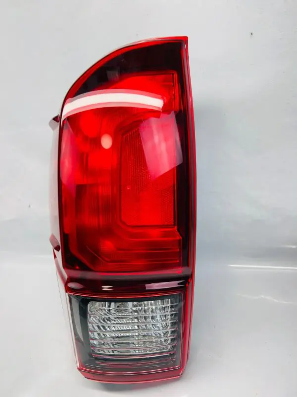 2016-2019 2020 2021 2022 2023 TOYOTA TACOMA TRD DARK BEZEL LEFT OEM TAIL LIGHT - Image 2