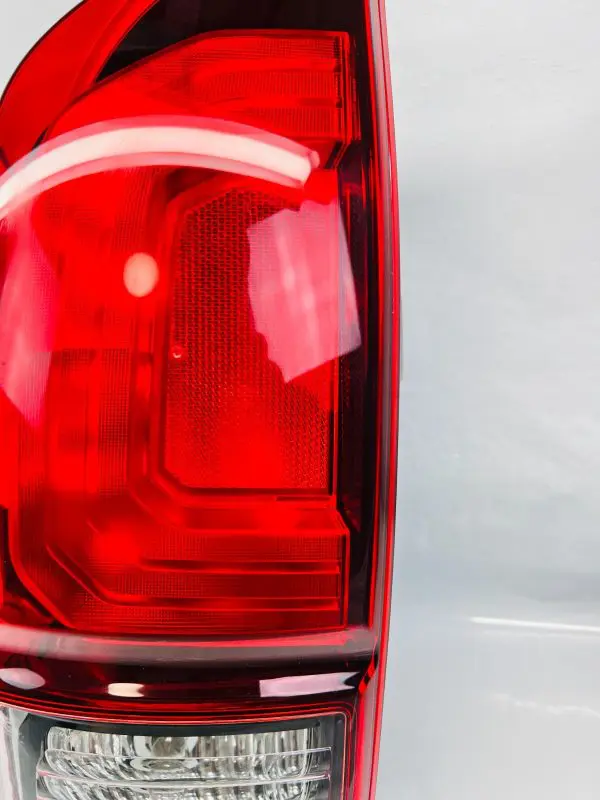 2016-2019 2020 2021 2022 2023 TOYOTA TACOMA TRD DARK BEZEL LEFT OEM TAIL LIGHT - Image 4