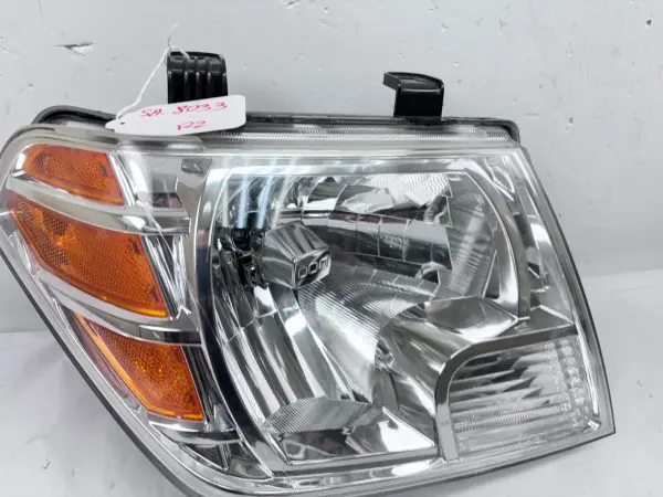 2009 2010 2011 2012 2013-2021 NISSAN FRONTIER HALOGEN FRONT RIGHT OEM HEADLIGHT - Image 8